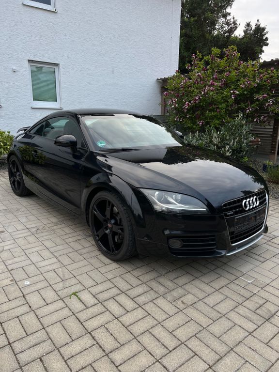 TT