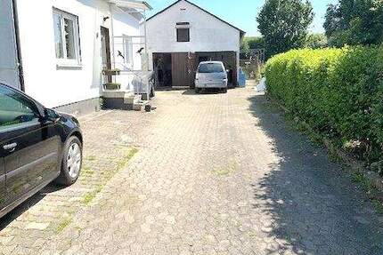 Erdgeschoss Wohnung mit Garage und Gartenanteil 3 zimmer