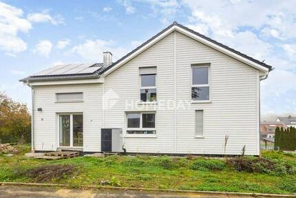 Modernes Mehrfamilienhaus in Hanglage - Traumhaftes Wohnen mit Pool, Garten und Dachterrasse 1 zimmer