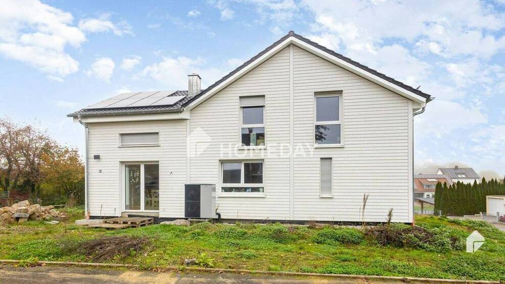 Modernes Mehrfamilienhaus in Hanglage - Traumhaftes Wohnen mit Pool, Garten und Dachterrasse