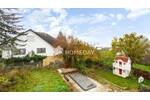 Modernes Mehrfamilienhaus in Hanglage - Traumhaftes Wohnen mit Pool, Garten und Dachterrasse