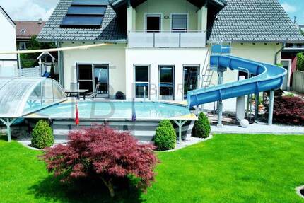 Modernes Einfamilienhaus mit beheiztem Pool: Spitzenenergieeffizienz mit nur 12 kWhm² 7 zimmer